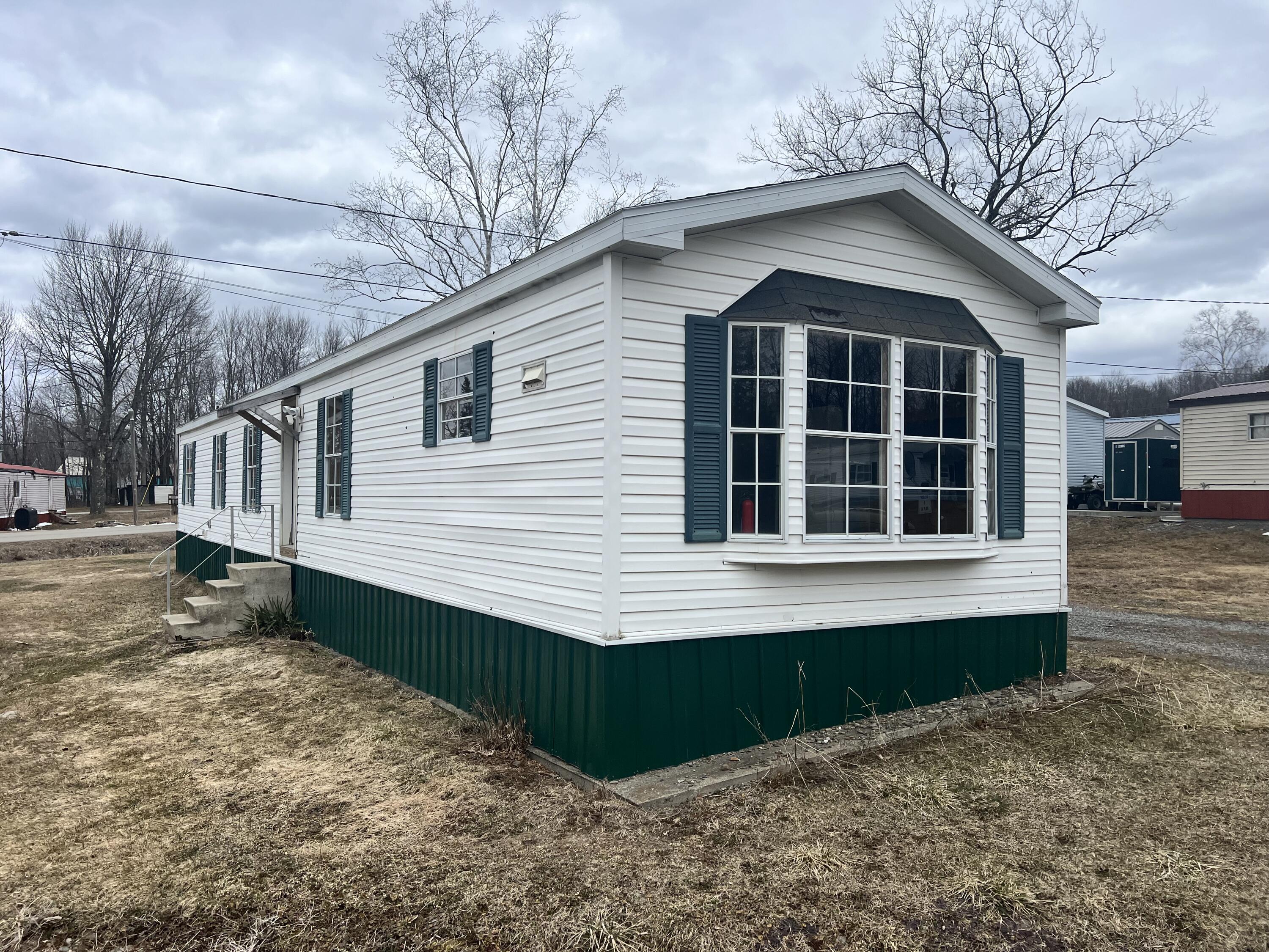 10 Christopher Road Dexter, ME 04930 - Photo 2 of 18 left front view