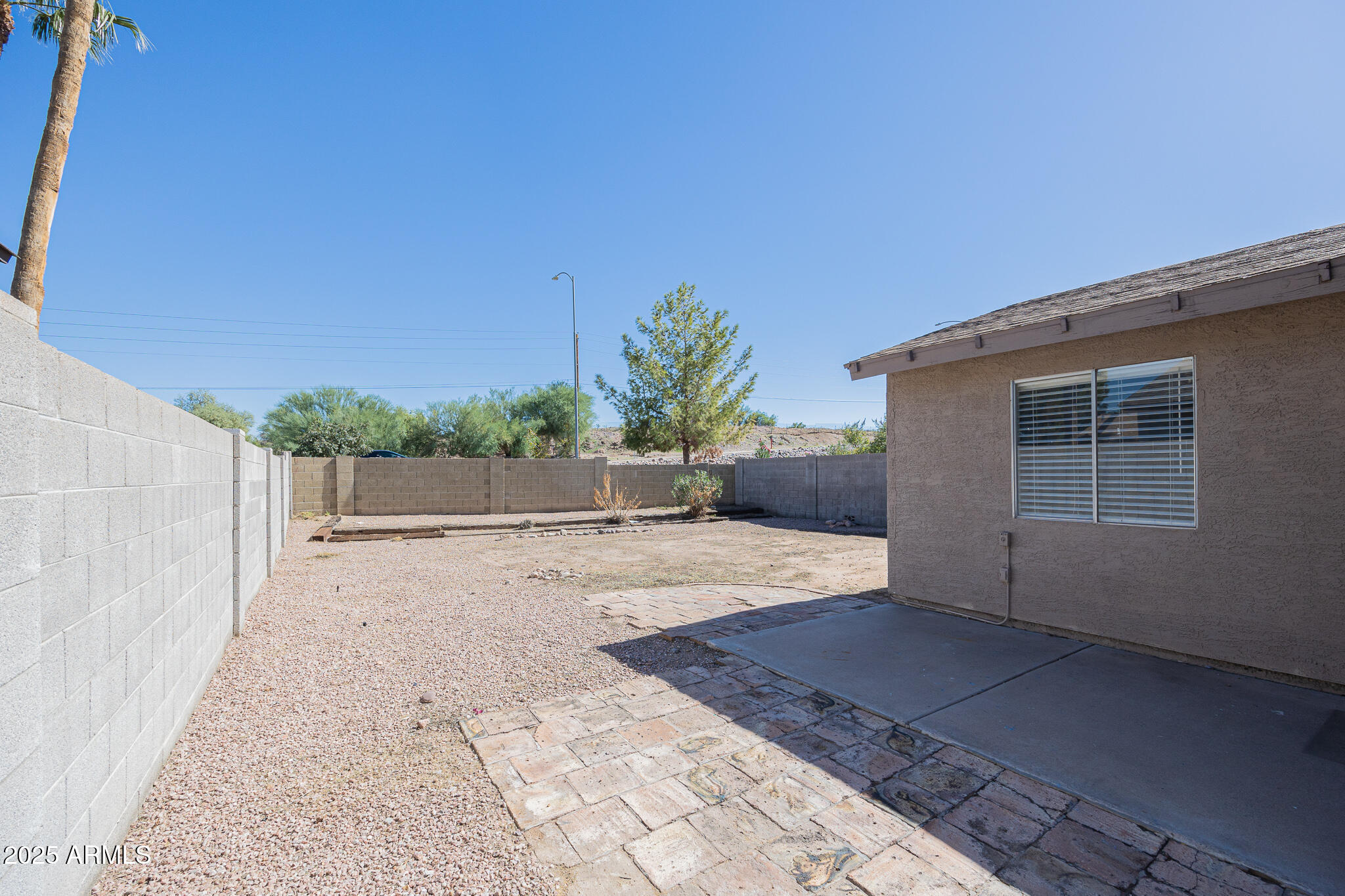 619 East Jensen Street, Unit 42 Mesa, AZ 85203 - Photo 21 of 24 a view of a backyard