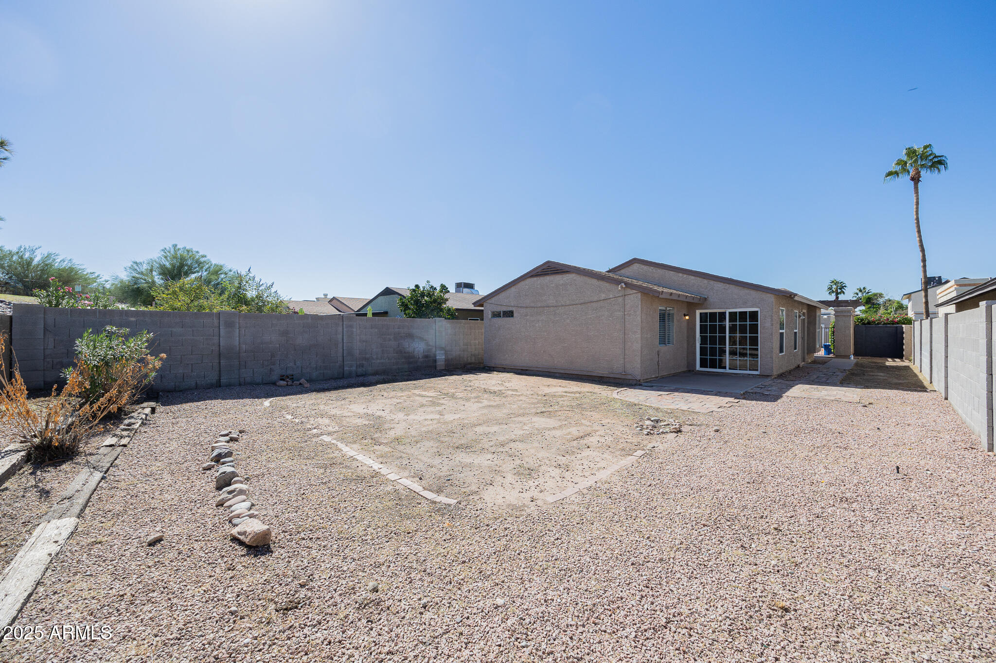 619 East Jensen Street, Unit 42 Mesa, AZ 85203 - Photo 22 of 24 a house view with a outdoor space