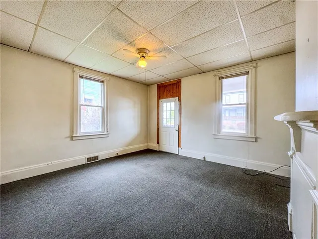 an empty room with windows