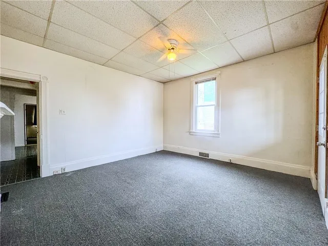 a kitchen with a stove and a refrigerator