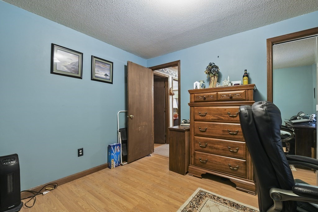279 Little Alum Road Brimfield, MA 01010 - Photo 15 of 37 a bedroom with a bed and a closet