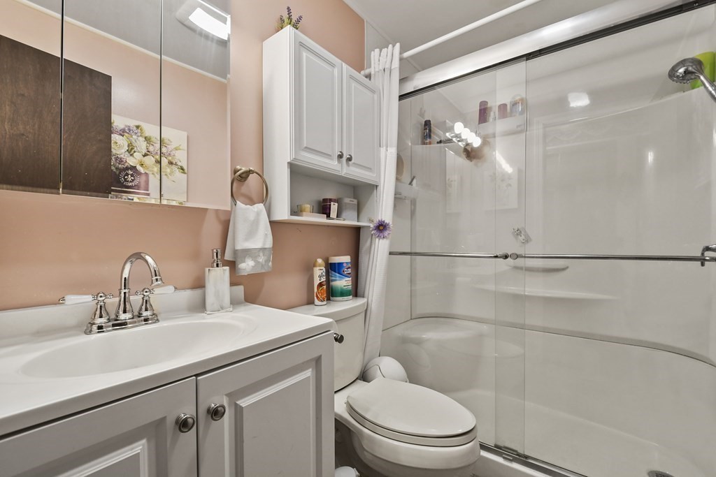 279 Little Alum Road Brimfield, MA 01010 - Photo 18 of 37 a bathroom with a sink a toilet and shower