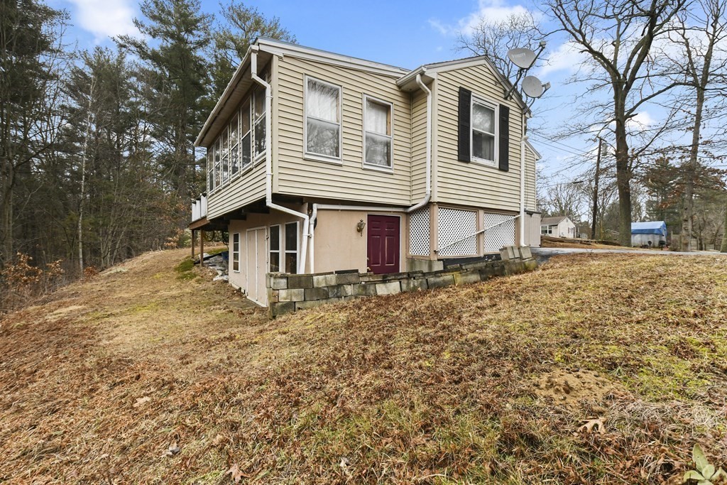279 Little Alum Road Brimfield, MA 01010 - Photo 29 of 37 a view of a house with a yard