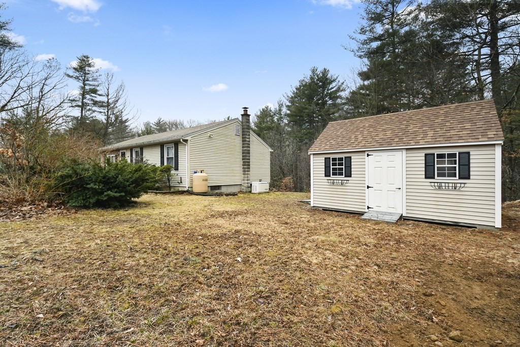 279 Little Alum Road Brimfield, MA 01010 - Photo 34 of 37 a house with trees in the background
