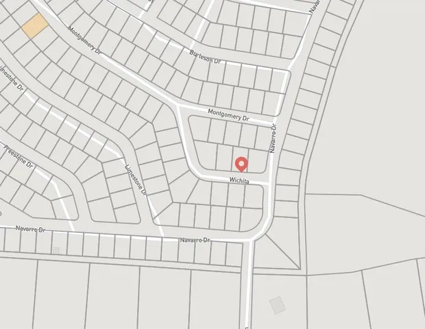 a bathroom with a shower and a window