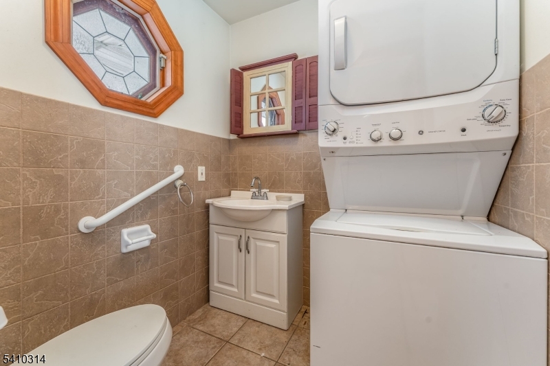 252 Mountain View Road West Asbury, NJ 08802 - Photo 7 of 28 a bathroom with a toilet and a sink