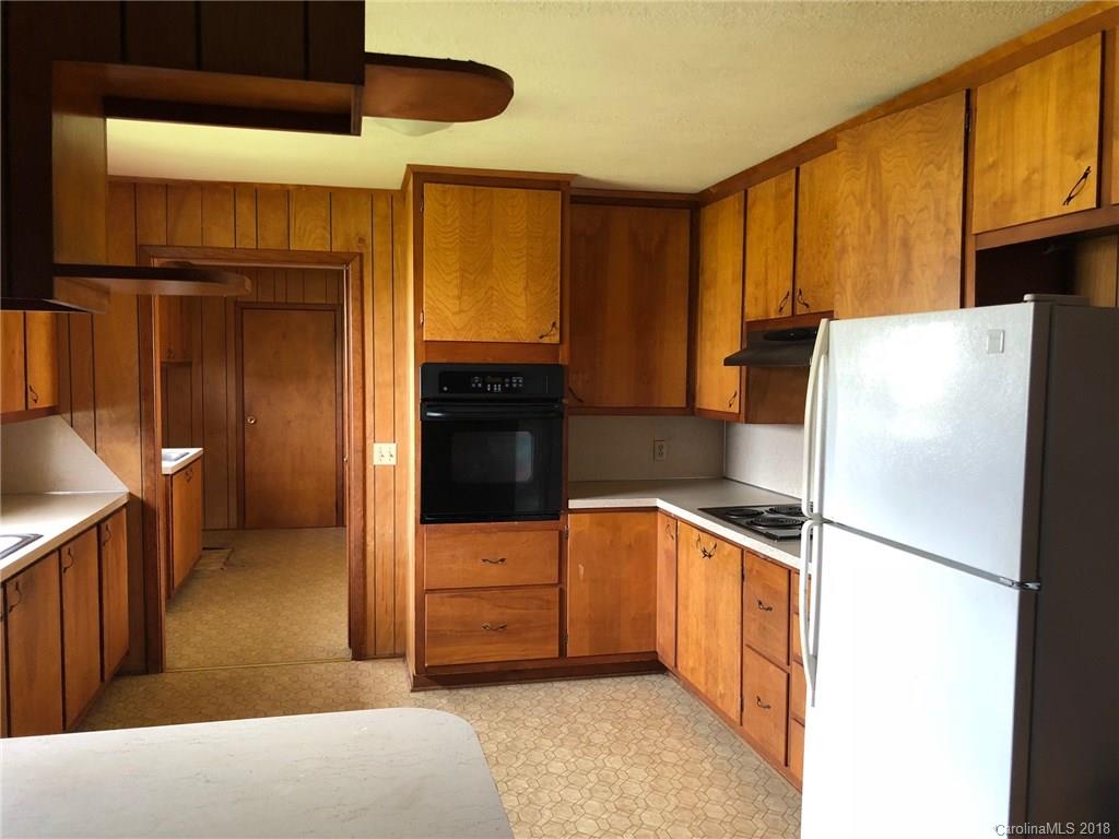 320 Weaver Road Salisbury, NC 28147 - Photo 5 of 10 a kitchen with stainless steel appliances a refrigerator and a stove