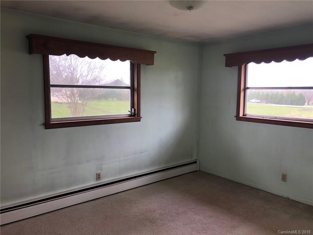 320 Weaver Road Salisbury, NC 28147 - Photo 7 of 10 an empty room with a window