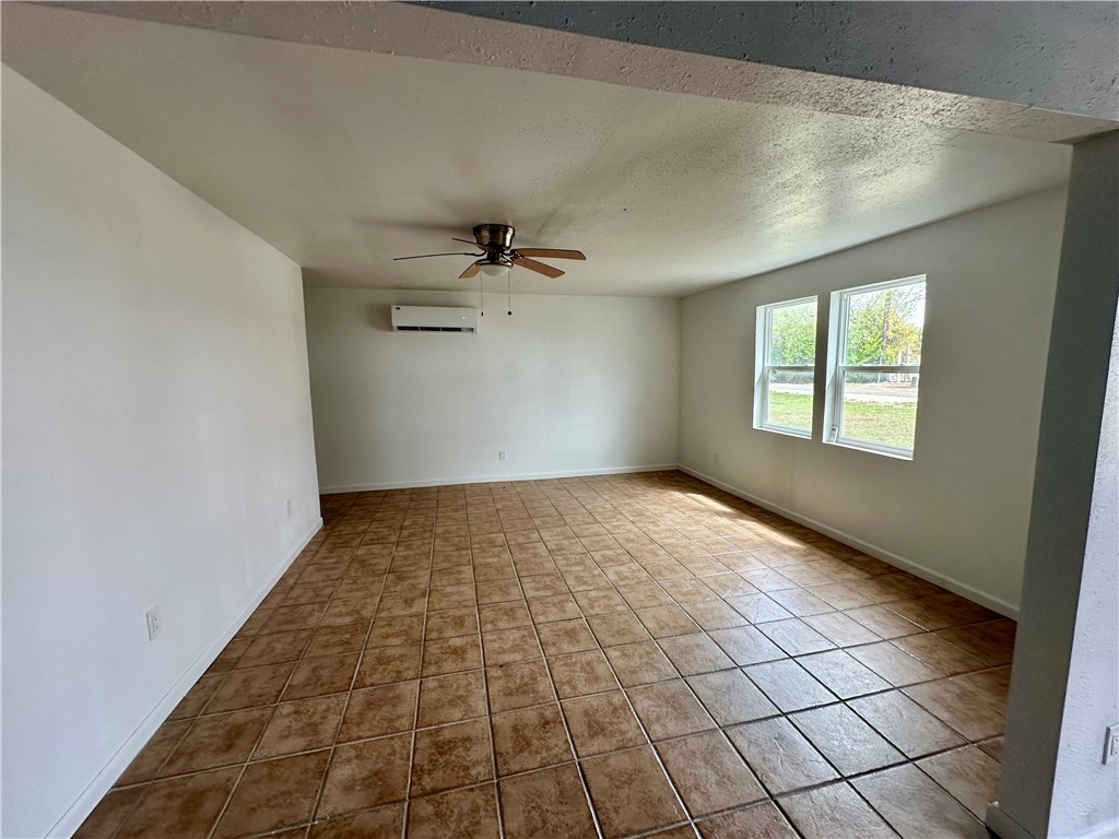 323 Copano Bayside, TX 78340 - Photo 8 of 22 en empty room with windows