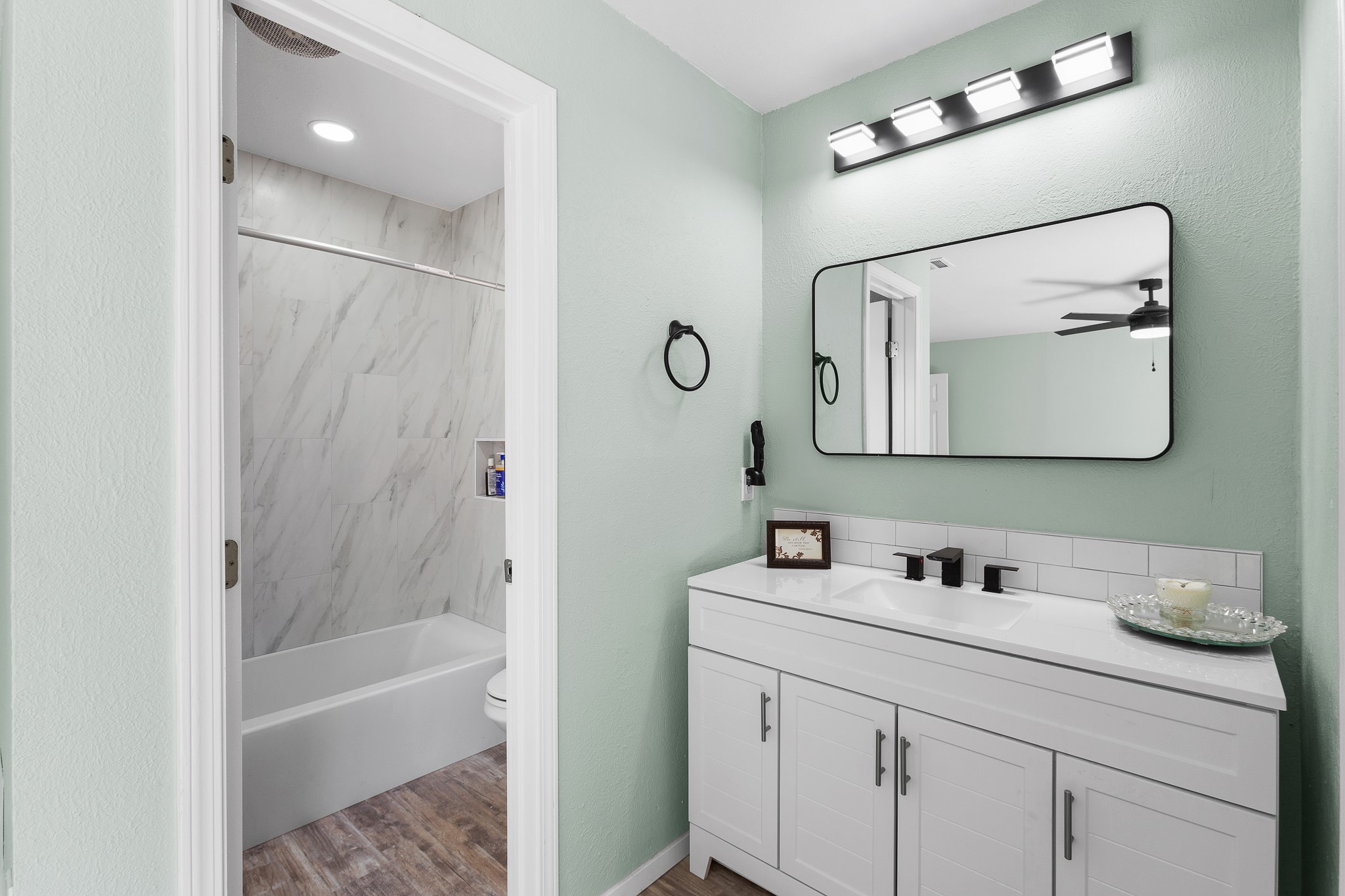 8007 Swindon Lane Austin, TX 78745 - Photo 15 of 27 Remodeled master with tub and new vanity