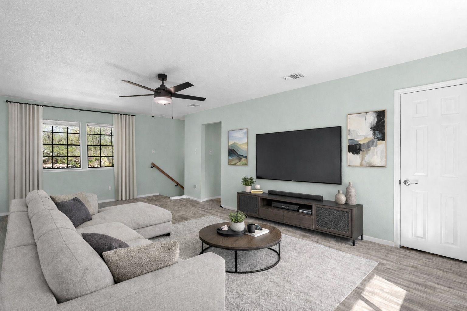 8007 Swindon Lane Austin, TX 78745 - Photo 17 of 27 Living room featuring ceiling fan and wood finished floors