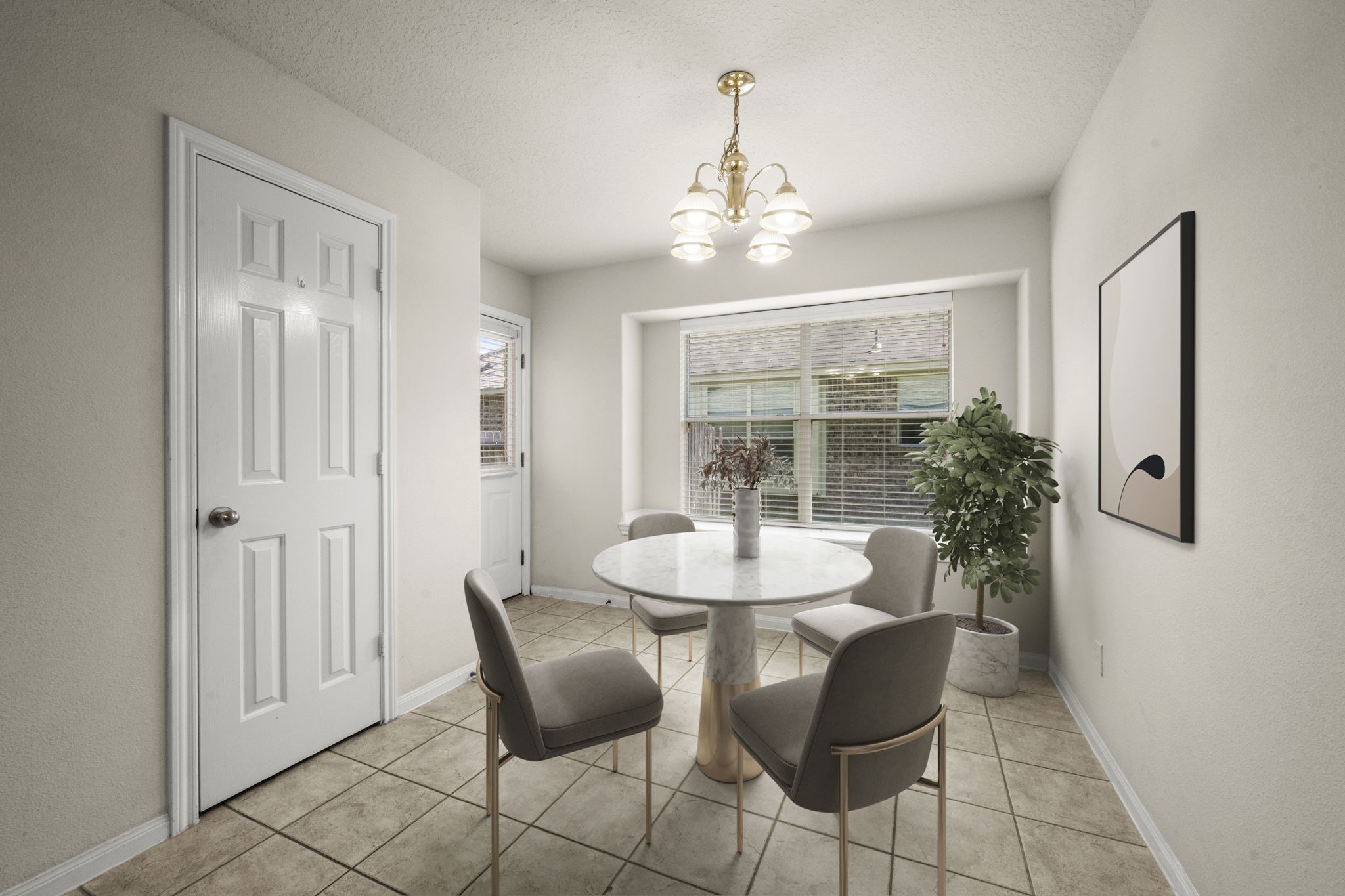 3226 Woodwind Road Montgomery, TX 77356 - Photo 13 of 34 a view of a dining room with furniture and chandelier