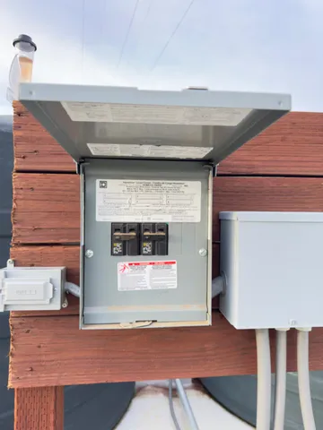 a front view of a house with a garage