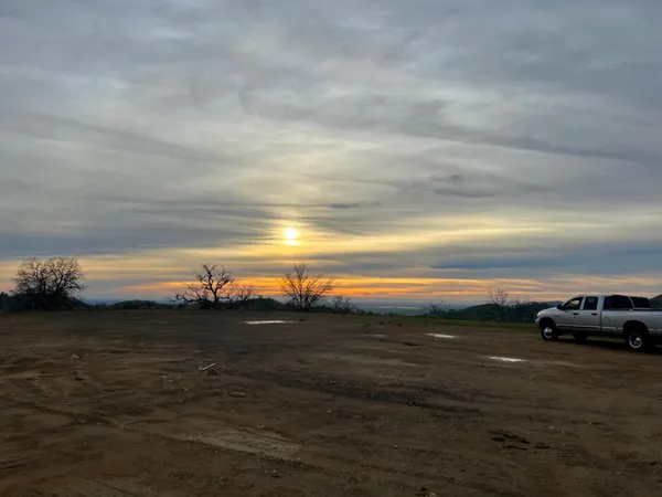 a view of an ocean and mountain