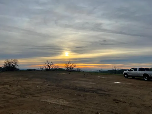 a view of an ocean and mountain