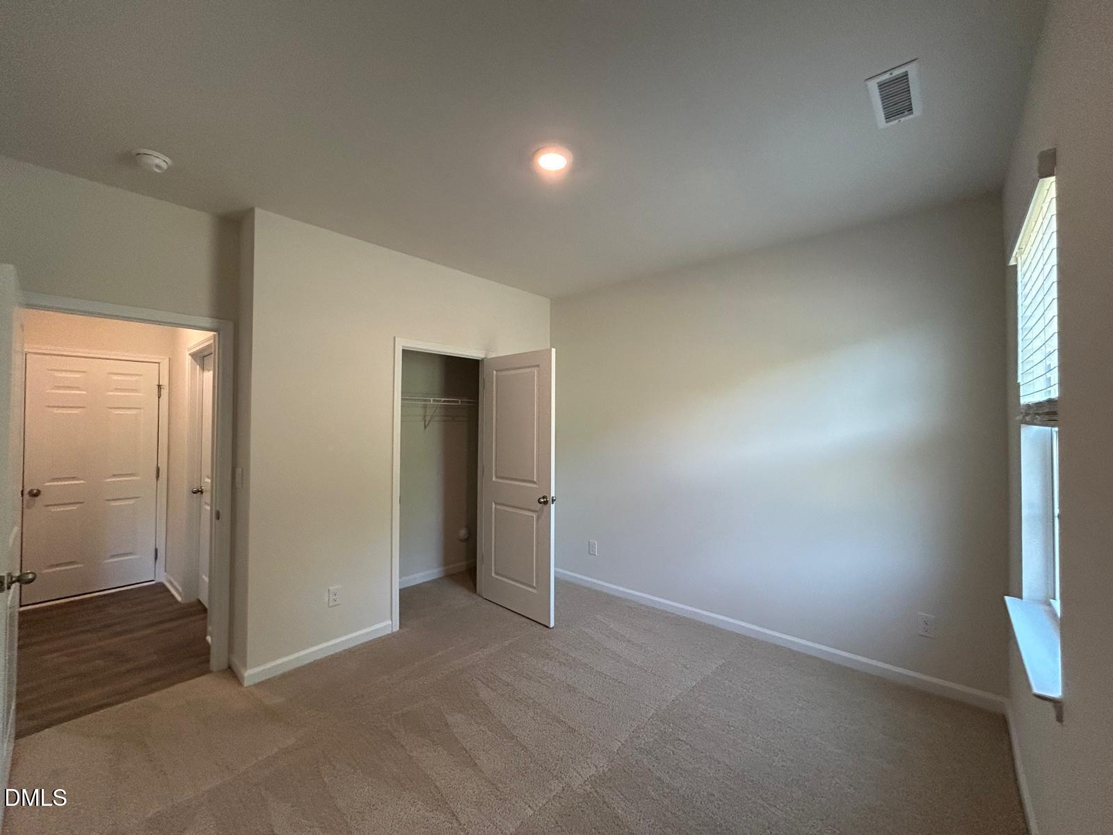2264 Fletchers Ridge Drive Durham, NC 27703 - Photo 14 of 41 13. Bedroom 1 view to bathroom and shoe