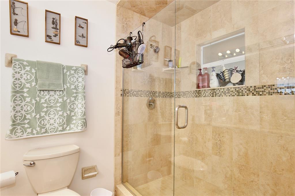 3415 Celena Circle St. Cloud, FL 34769 - Photo 11 of 20 a bathroom with a sink toilet and shower