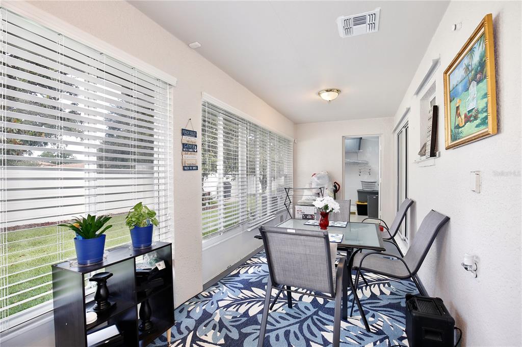 3415 Celena Circle St. Cloud, FL 34769 - Photo 16 of 20 a dining room with furniture and wooden floor