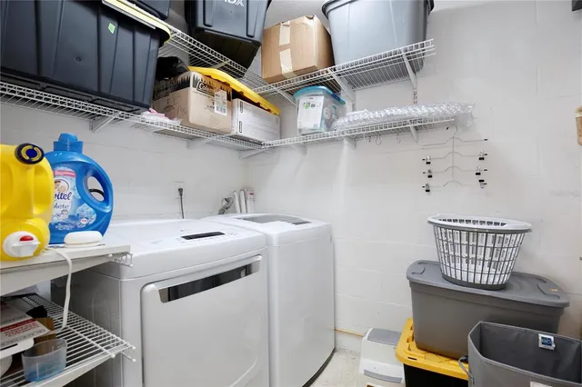 a utility room with dryer and washer