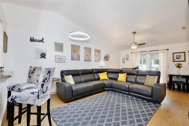 a living room with furniture and a couch