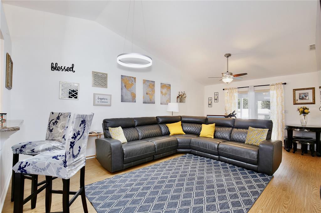 3415 Celena Circle St. Cloud, FL 34769 - Photo 3 of 20 a living room with furniture and a couch