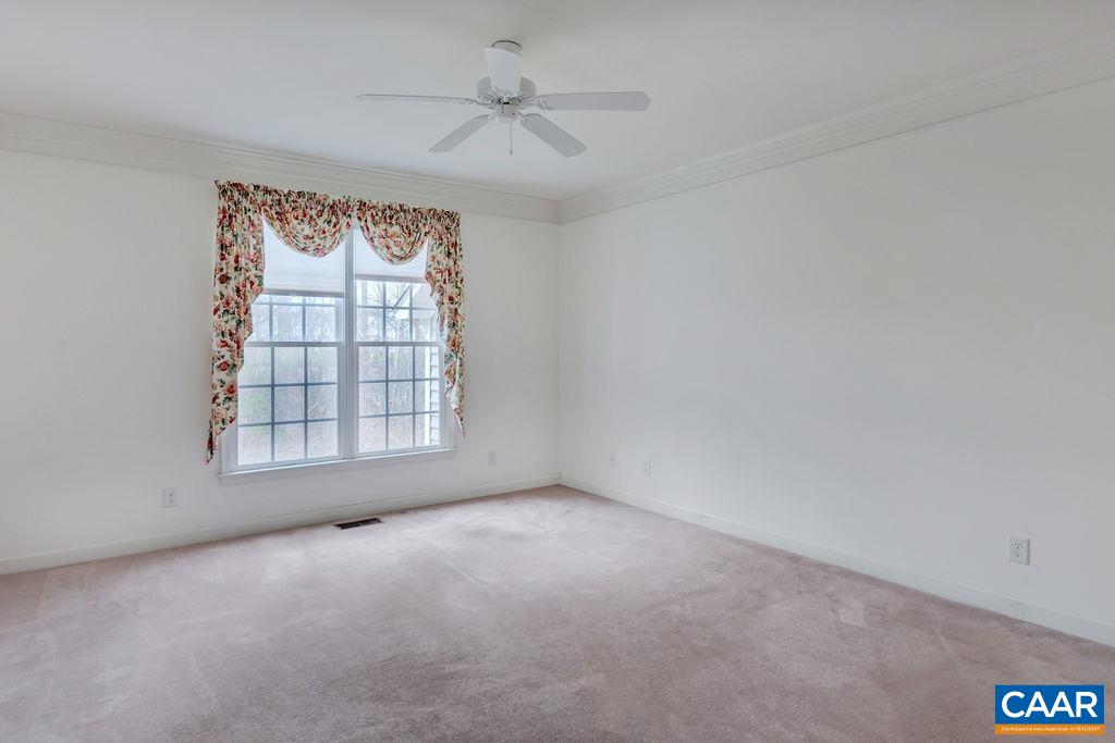 2135 Shepherds Ridge Road Charlottesville, VA 22901 - Photo 8 of 56 an empty room with windows