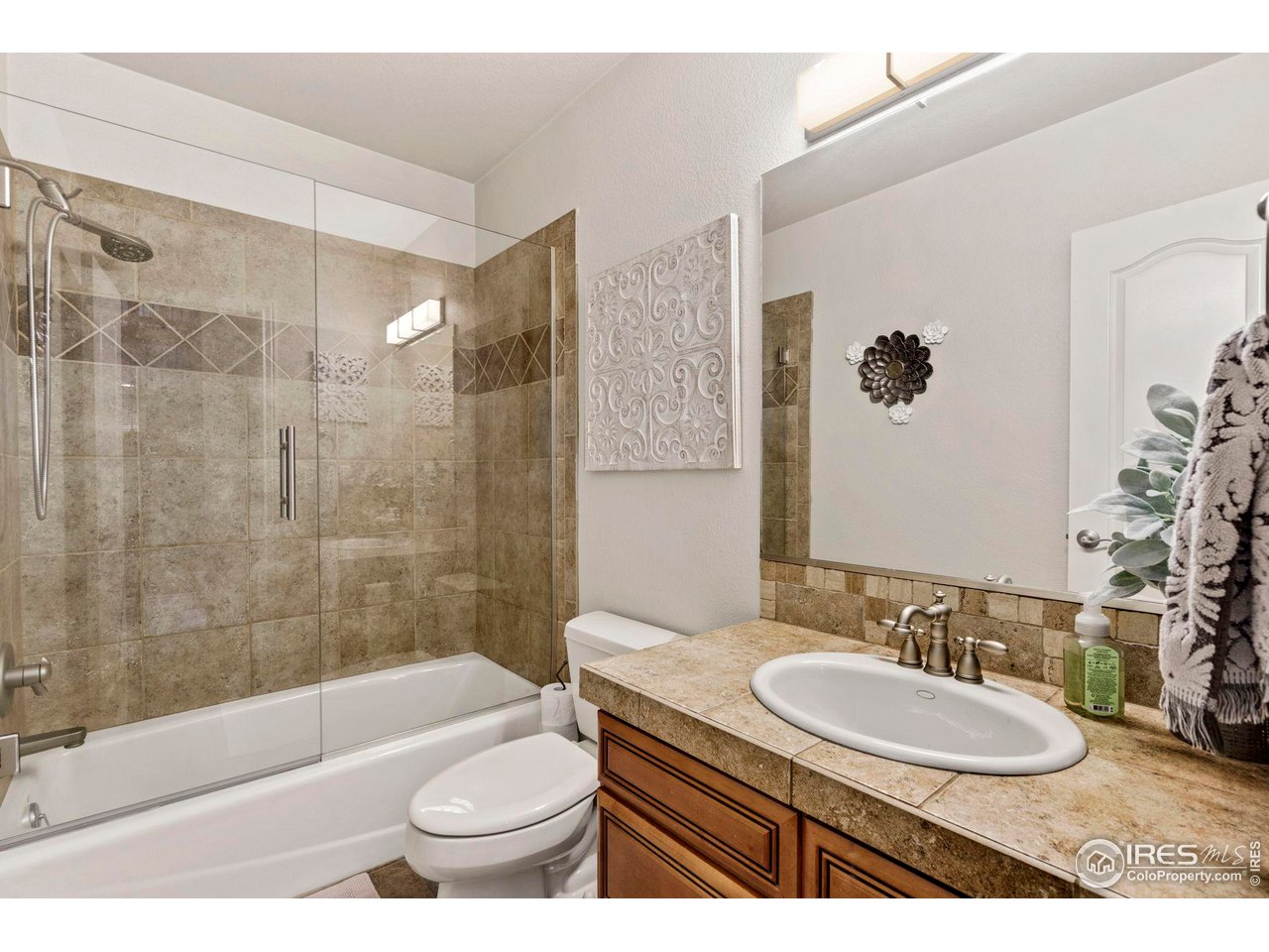 7702 Plateau Road Greeley, CO 80634 - Photo 13 of 40 Main Floor Full Bathroom Outside of Office Space