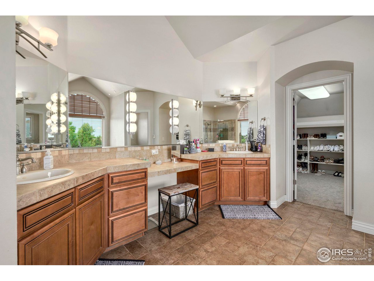 7702 Plateau Road Greeley, CO 80634 - Photo 17 of 40 Primary Full 5 Piece Bathroom with Dual Vanities, Make Up Counter & Spacious Walk In Closet Space!