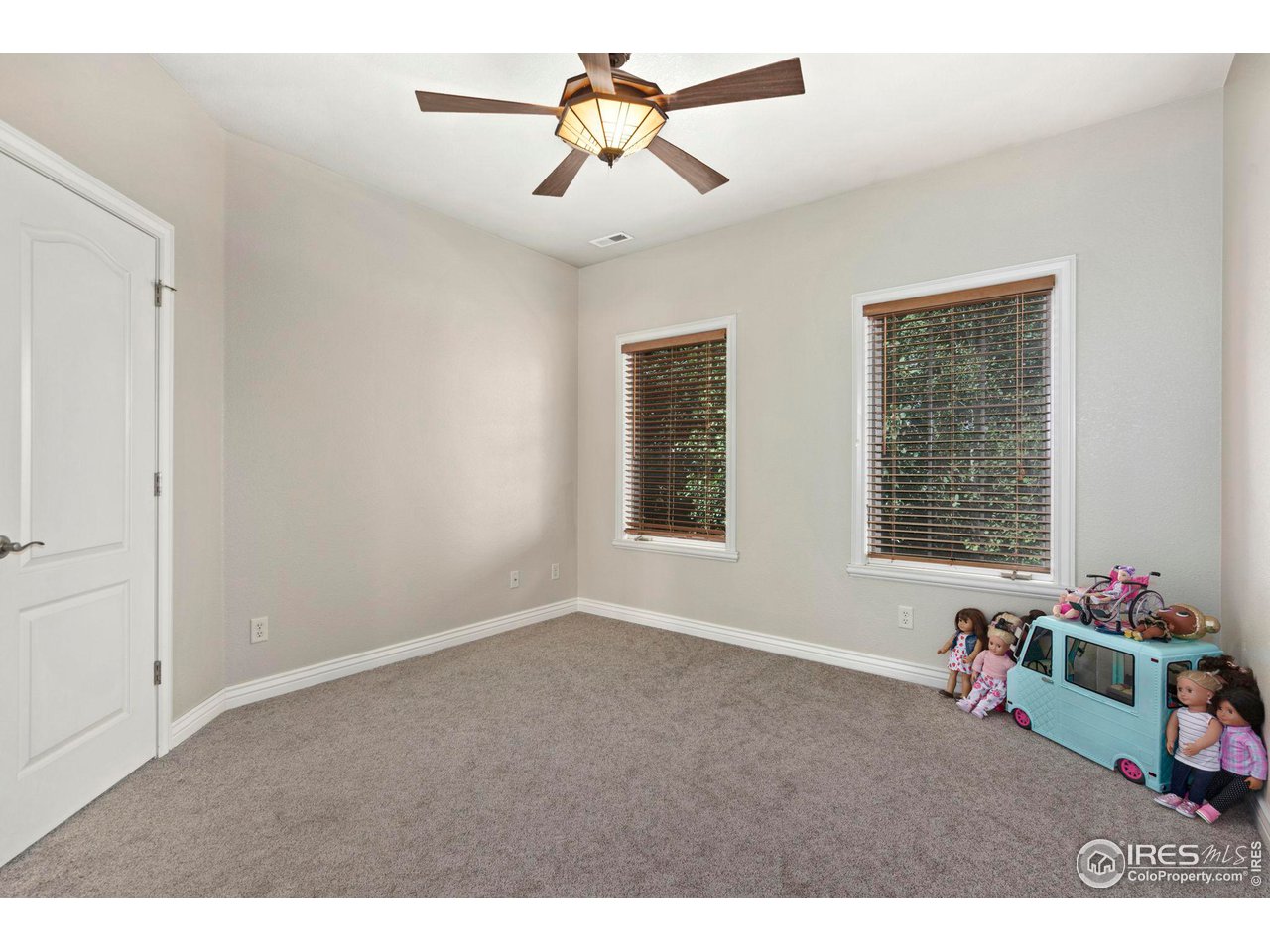 7702 Plateau Road Greeley, CO 80634 - Photo 24 of 40 5th Bedroom with Ceiling Fan, Large Closet, Attached Bathroom & Windows to the Back!