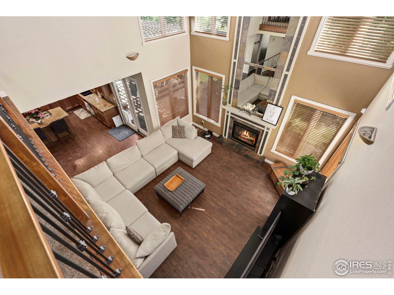 7702 Plateau Road Greeley, CO 80634 - Photo 5 of 40 Vaulted Ceilings, Open to Great Room from Upstairs. Open & Inviting!