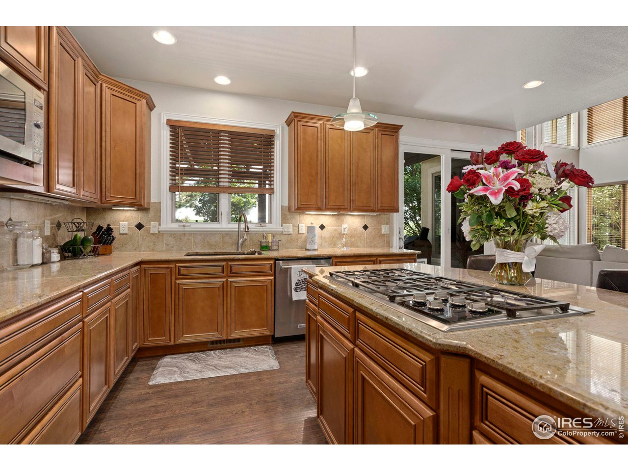 7702 Plateau Road Greeley, CO 80634 - Photo 8 of 40 Gas Range, Granite Countertops Throughout!
