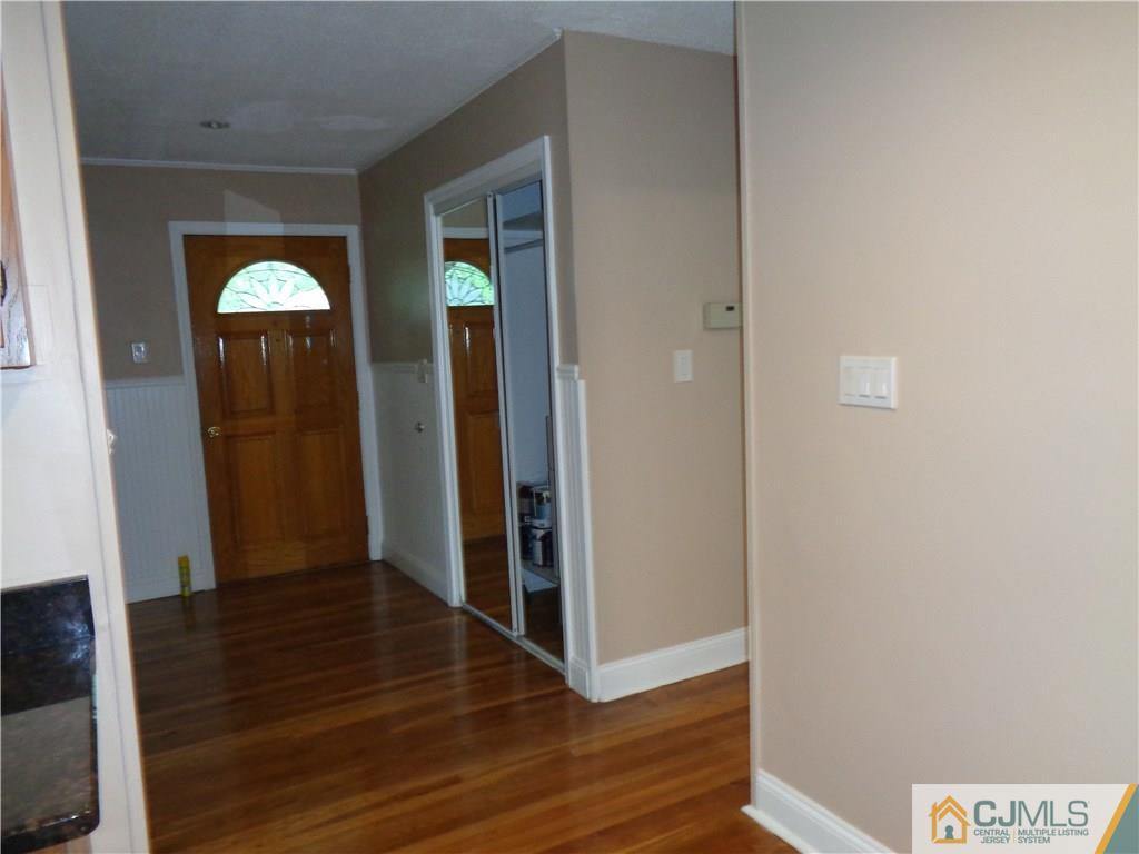 14 Bucknell Road Old Bridge, NJ 08859 - Photo 5 of 15 a view of empty room with wooden floor