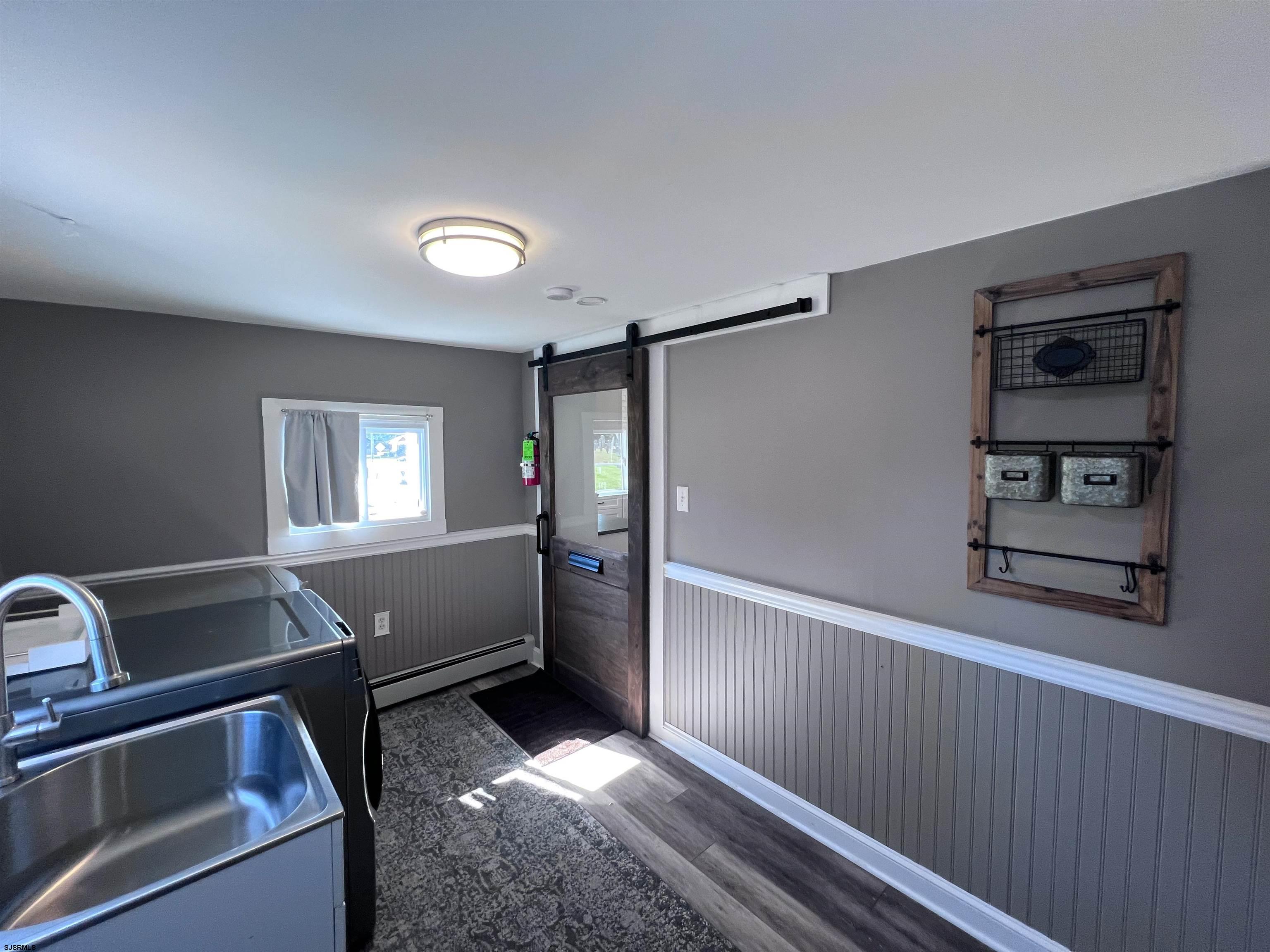 114 Shore Road, Unit YEARLY RENTAL Linwood, NJ 08221 - Photo 11 of 39 a room with furniture and window