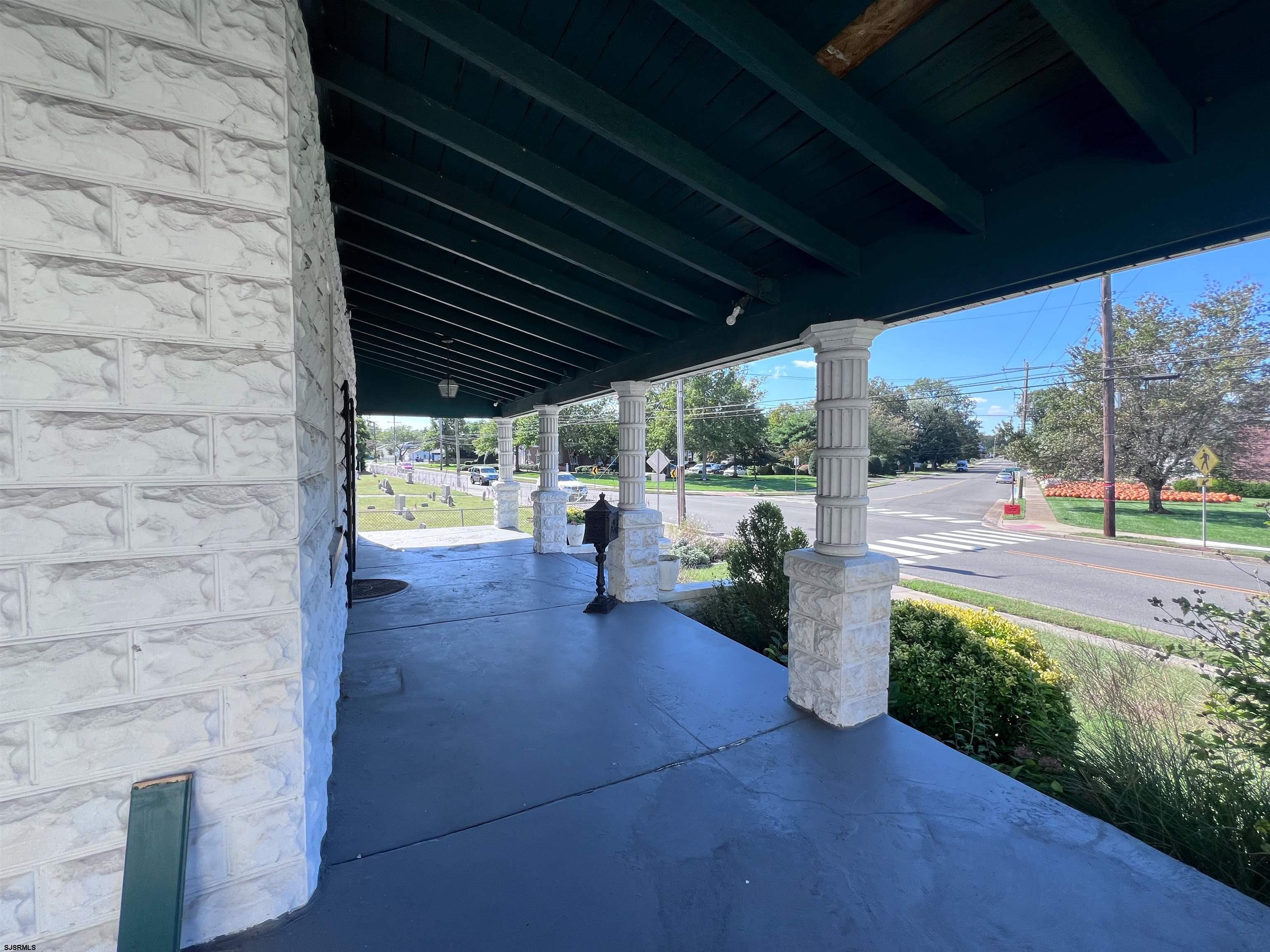 114 Shore Road, Unit YEARLY RENTAL Linwood, NJ 08221 - Photo 23 of 39 a view of a porch with furniture and garden