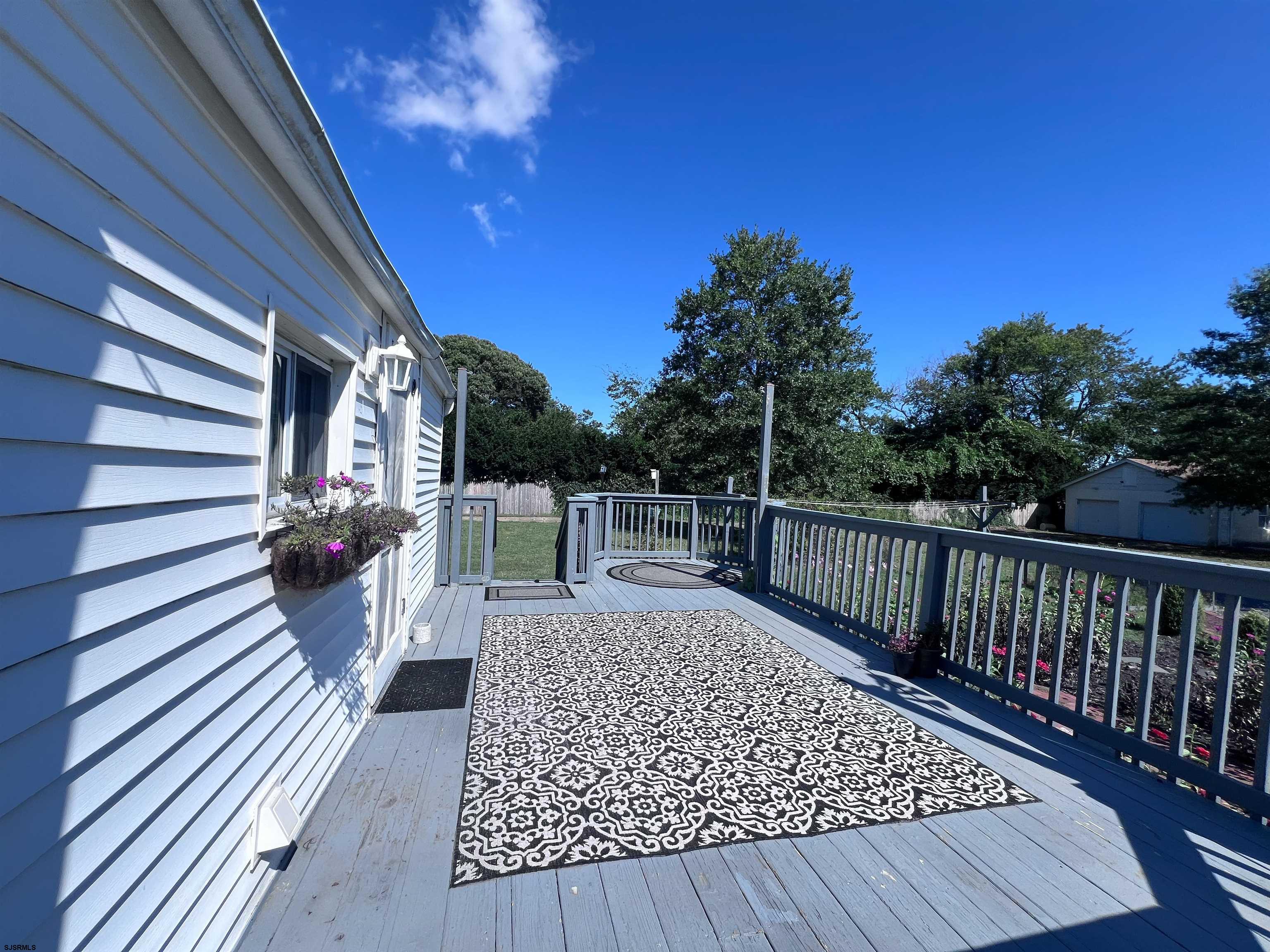 114 Shore Road, Unit YEARLY RENTAL Linwood, NJ 08221 - Photo 25 of 39 a view of deck with wooden floor and fence