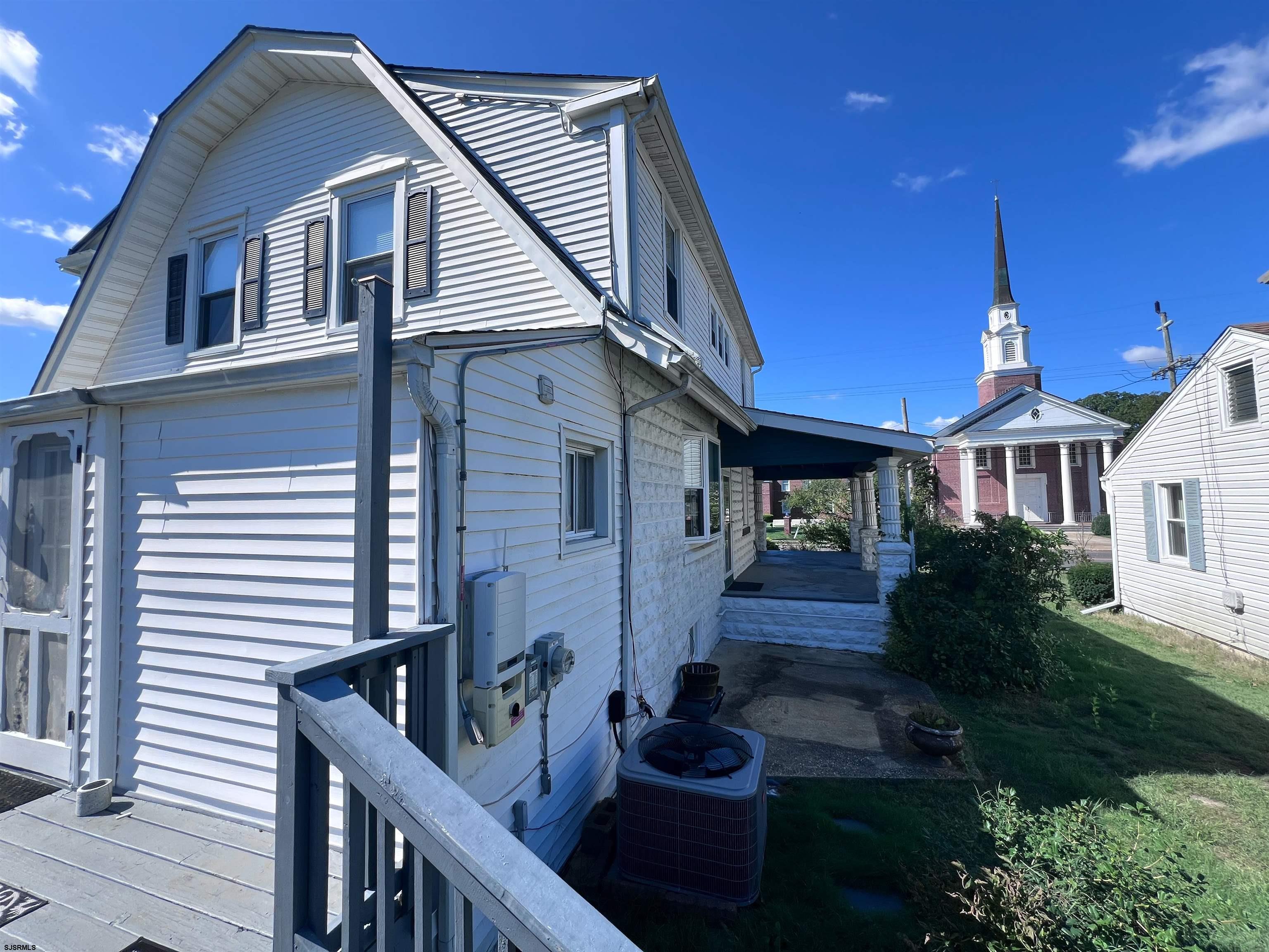 114 Shore Road, Unit YEARLY RENTAL Linwood, NJ 08221 - Photo 27 of 39 a front view of a house with a yard