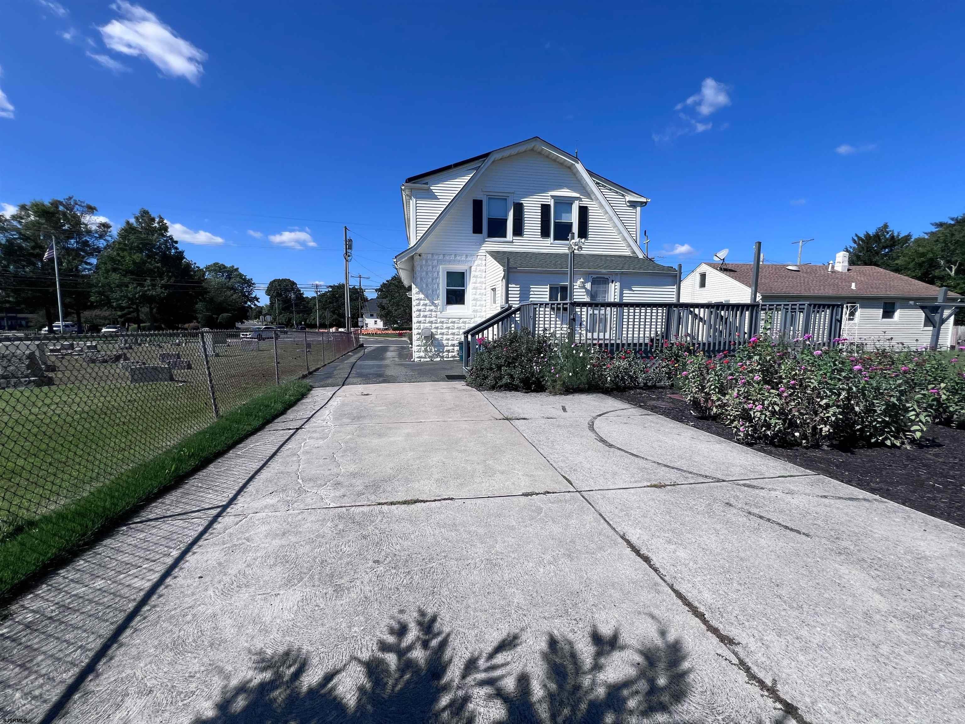 114 Shore Road, Unit YEARLY RENTAL Linwood, NJ 08221 - Photo 29 of 39 a front view of a house with a yard