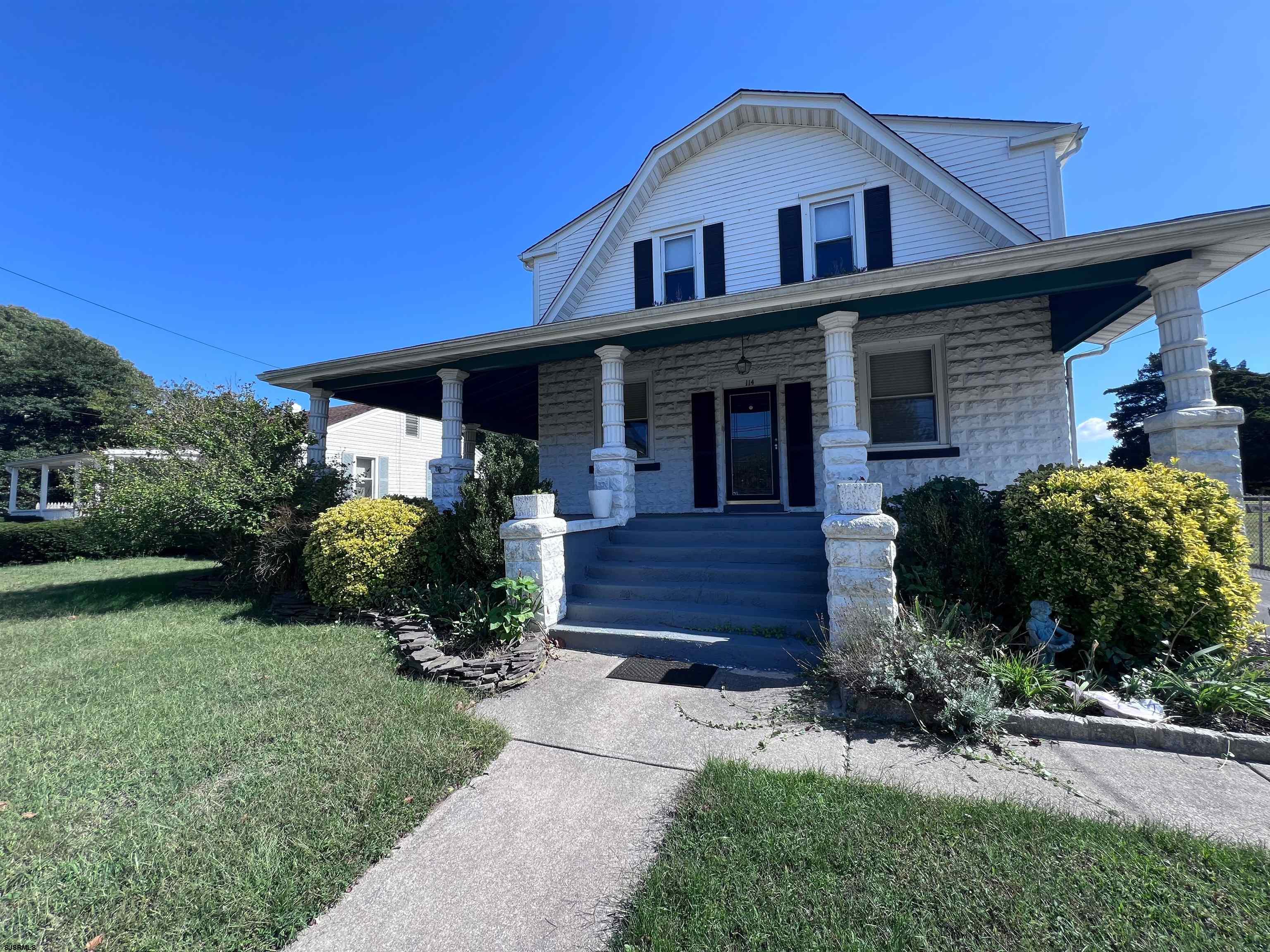 114 Shore Road, Unit YEARLY RENTAL Linwood, NJ 08221 - Photo 3 of 39 a front view of a house with a yard