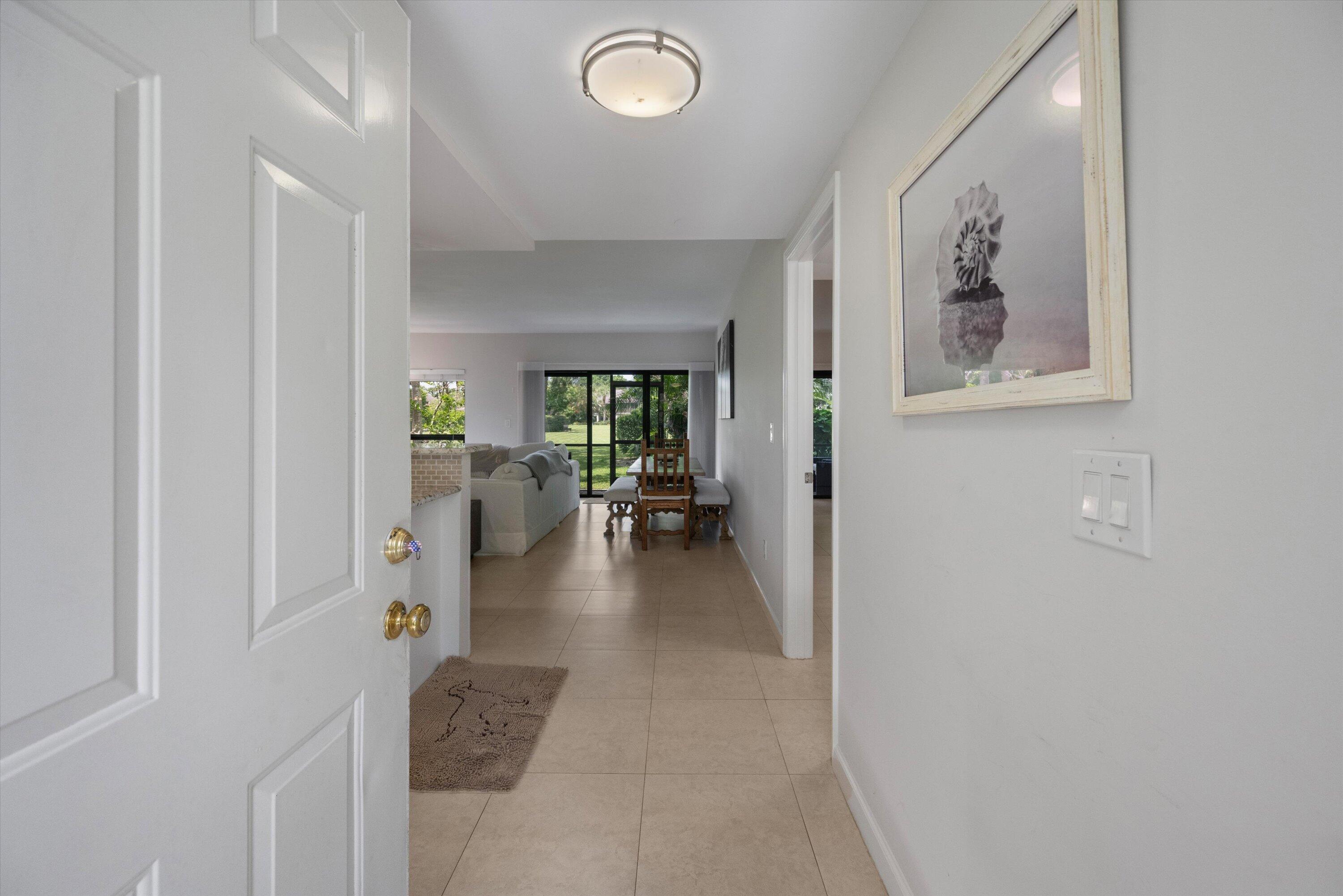 13334 Polo Club Road, Unit 228 Wellington, FL 33414 - Photo 2 of 24 Foyer