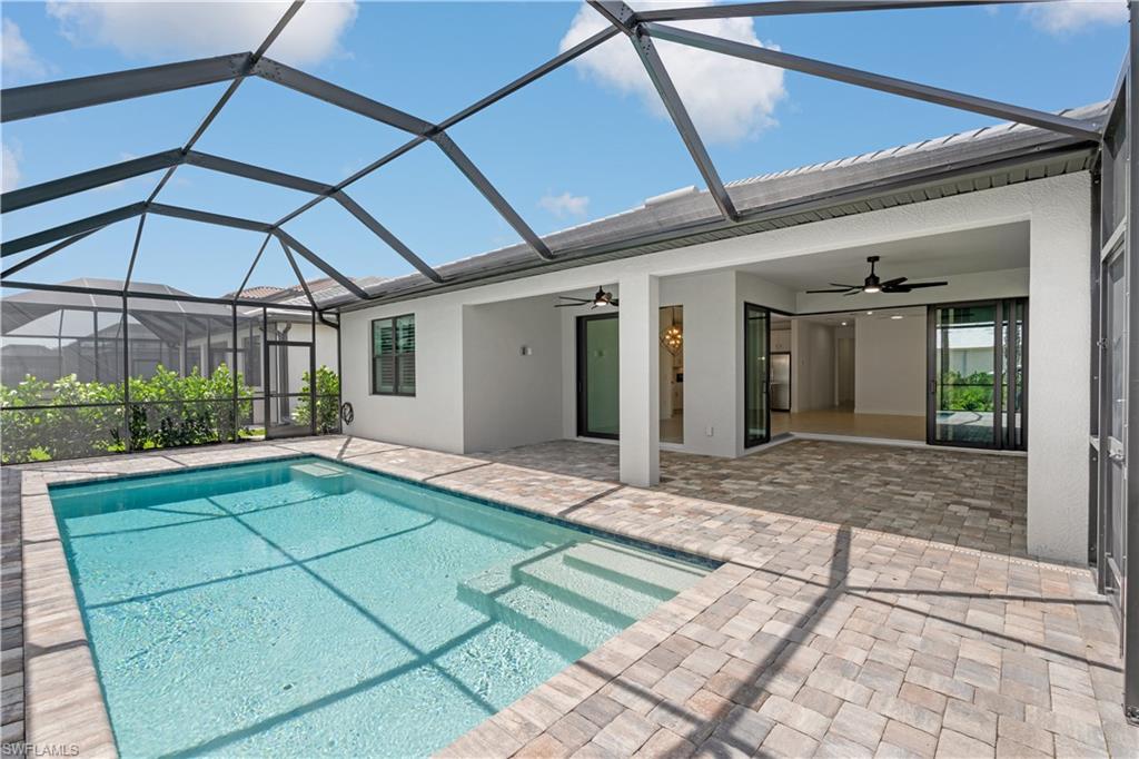 2104 Freemont Way Naples, FL 34119 - Photo 10 of 27 Covered area for outside dining