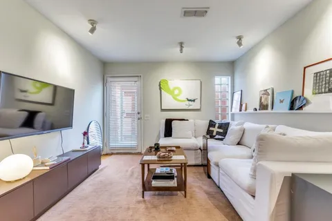 a living room with furniture and a couch