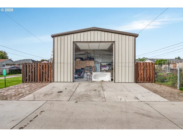 a view of entrance gate of a house