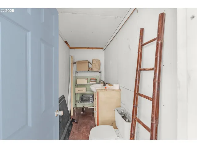 a picture of a room with furniture and a window