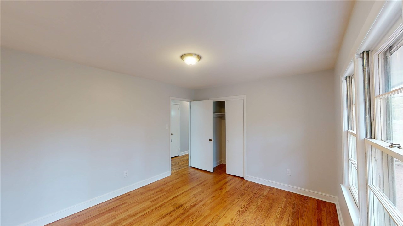 108 Rand Road Raleigh, NC 27603 - Photo 12 of 29 Delightful bedroom has double door closet, hardwood floors, and fabulous view. Someone will be excited to get this room. :) 2nd Bedroom
