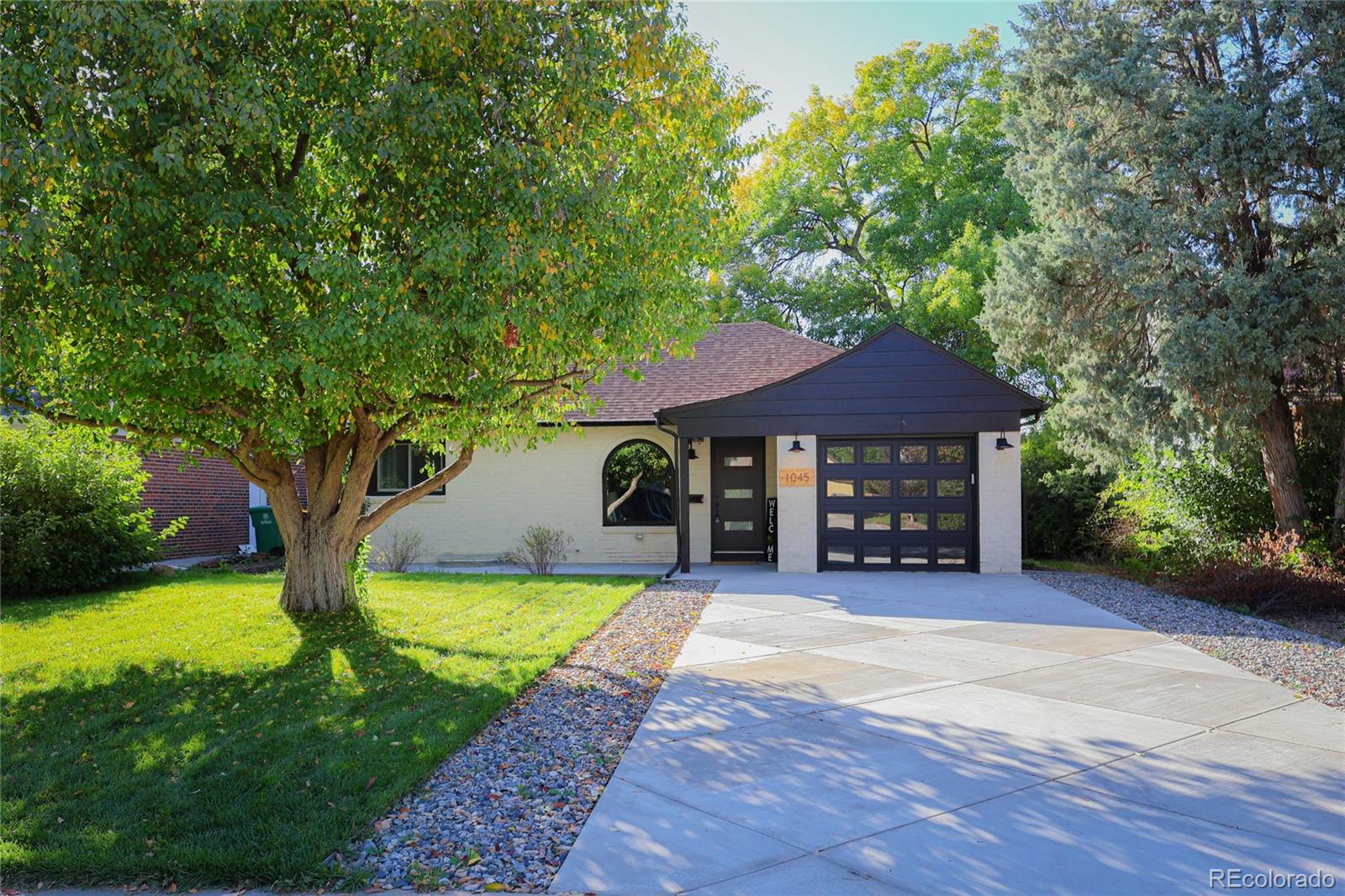 a view of a house with swimming pool and porch with furniture