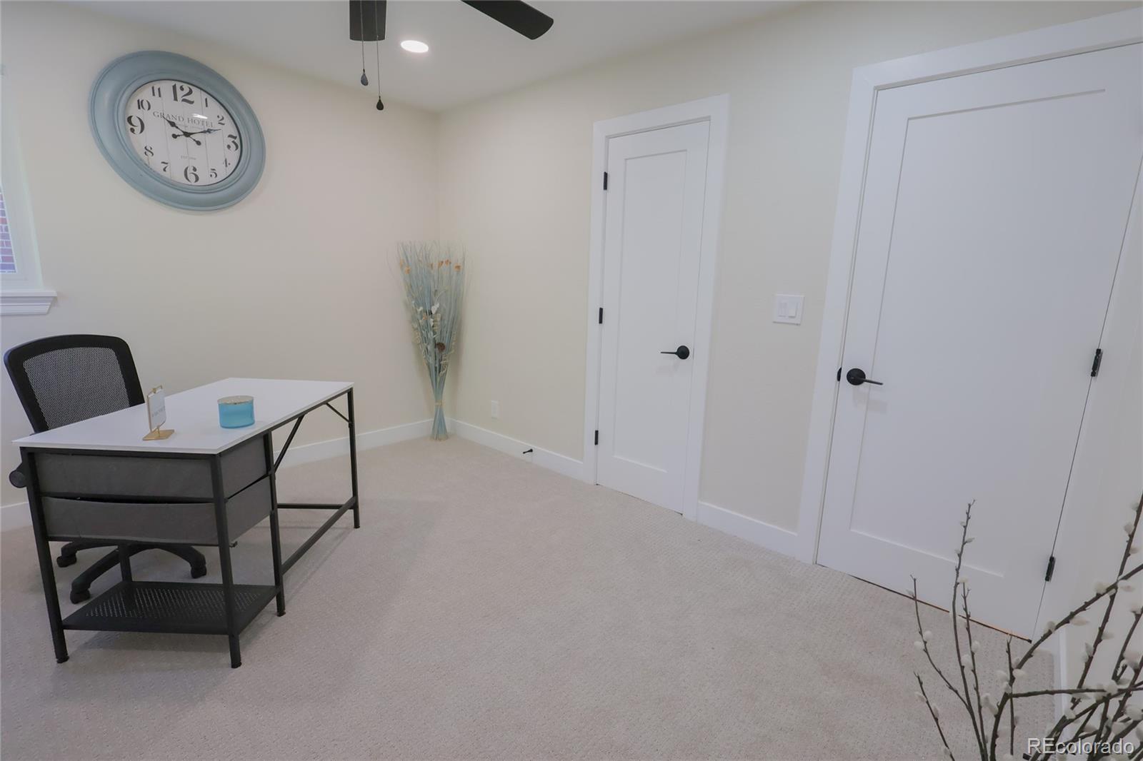 1045 Locust Street Denver, CO 80220 - Photo 12 of 18 a view of a livingroom with a bench