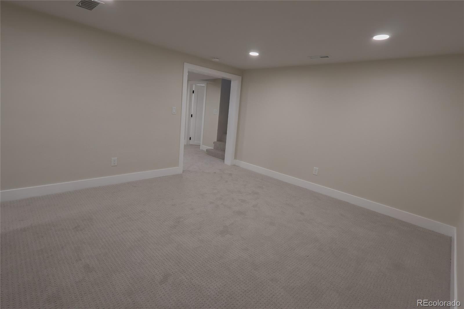 1045 Locust Street Denver, CO 80220 - Photo 14 of 18 a view of an empty room