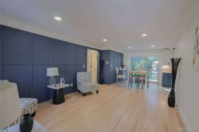 a large room with furniture and a large window