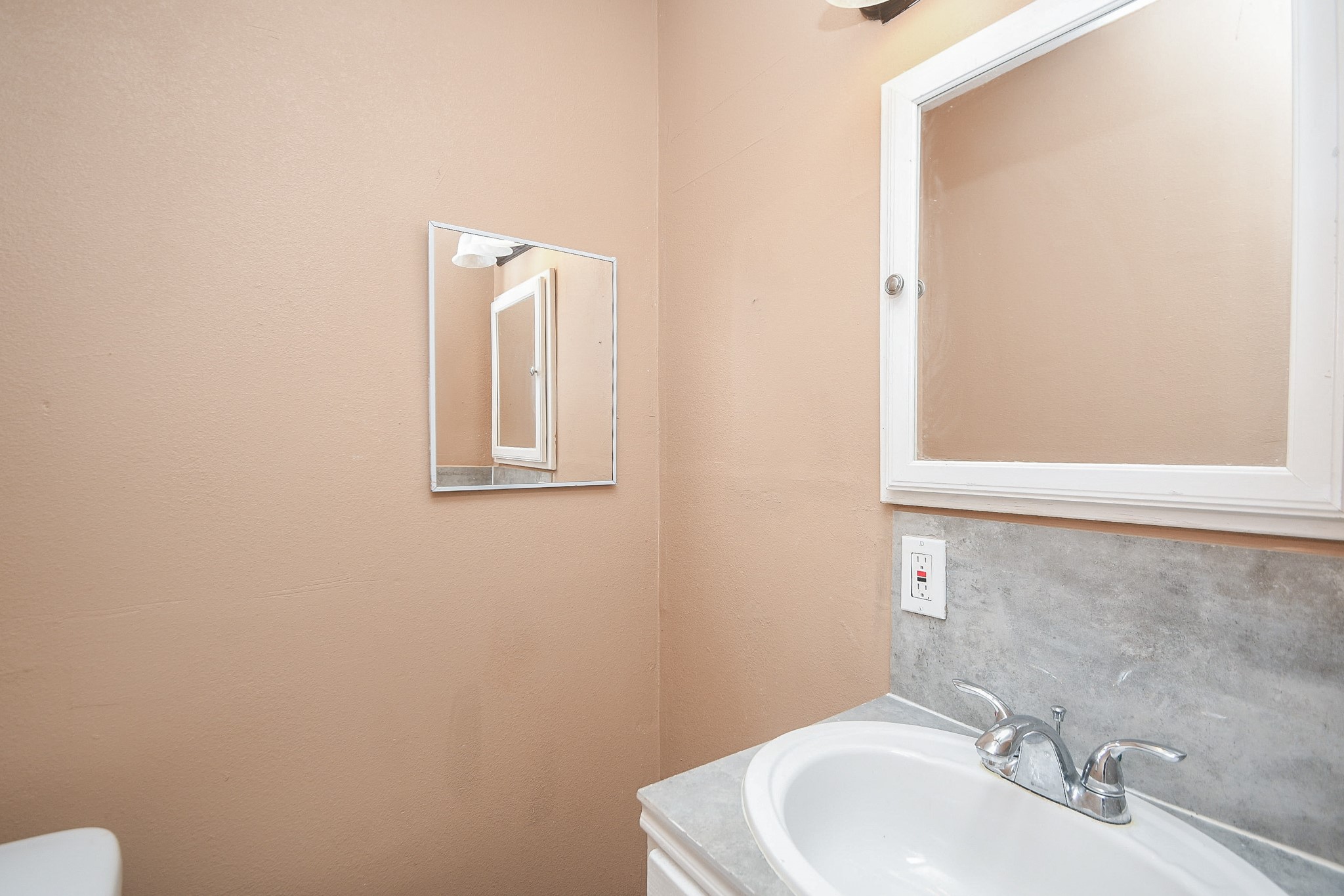 5411 Regal Ridge Lane Houston, TX 77053 - Photo 13 of 20 a bathroom with a sink and a mirror